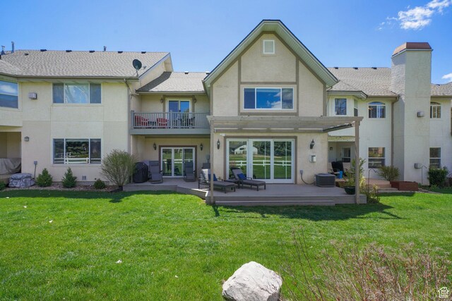 384 N Cottage Creek Ct W, Midway, UT 84049 - rear view of property featuring a balcony, a yard, and stucco siding