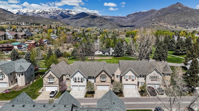 bird's eye view with a residential view and a mountain view