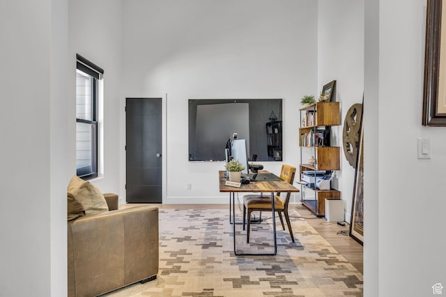 846 E 270 S, Kamas, UT 84036 - home office featuring a high ceiling, baseboards, and light wood-style floors