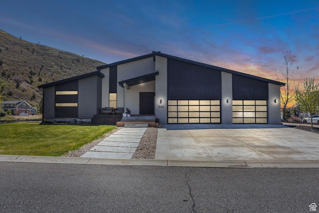 846 E 270 S, Kamas, UT 84036 - contemporary house with a front lawn, an attached garage, driveway, and stucco siding