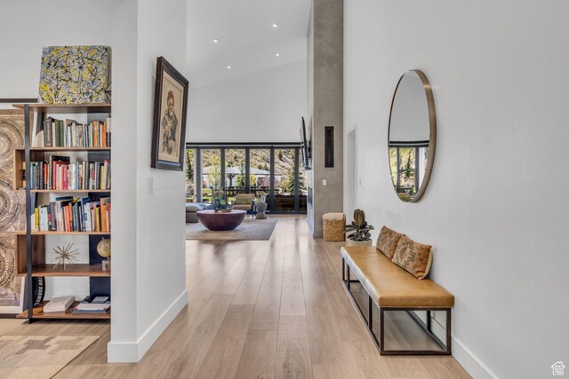 846 E 270 S, Kamas, UT 84036 - hallway featuring a towering ceiling, healthy amount of natural light, wood finished floors, baseboards, and recessed lighting