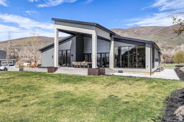 846 E 270 S, Kamas, UT 84036 - back of property featuring a mountain view, a yard, and a patio area