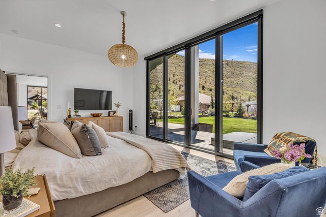 846 E 270 S, Kamas, UT 84036 - bedroom featuring access to outside, floor to ceiling windows, light wood-type flooring, and recessed lighting