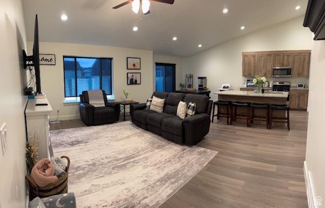 88 E 970 N, Santaquin, UT 84655 - living area featuring light wood finished floors, lofted ceiling, a ceiling fan, and recessed lighting