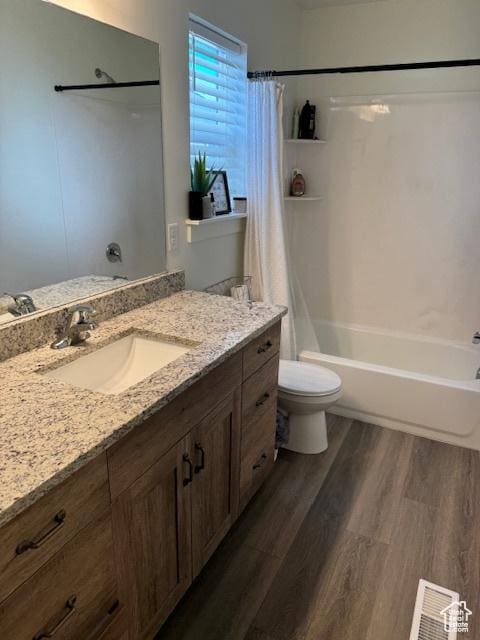 88 E 970 N, Santaquin, UT 84655 - bathroom with shower / bath combination with curtain, toilet, wood finished floors, visible vents, and vanity