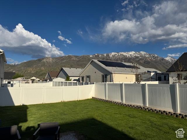 88 E 970 N, Santaquin, UT 84655 - view of yard featuring a mountain view, a residential view, and a fenced backyard