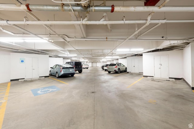 228 E 500 S Unit 301, Salt Lake City, UT 84111 - parking deck featuring a storage unit