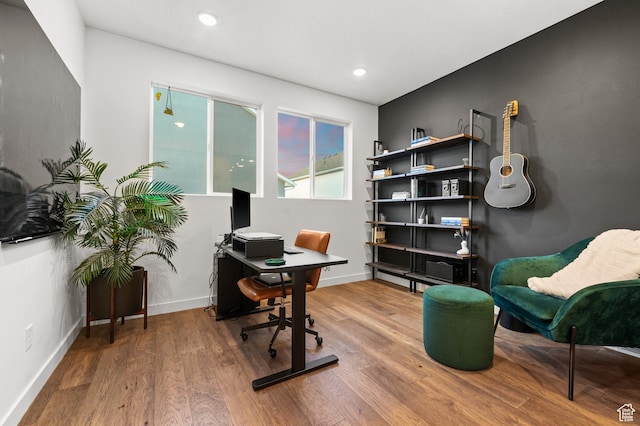office space featuring baseboards, recessed lighting, and wood finished floors