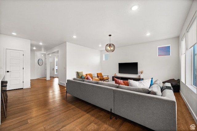 living room featuring recessed lighting and wood finished floors