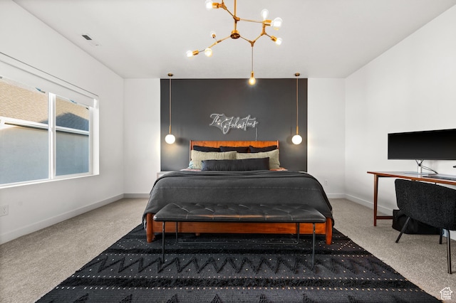bedroom with baseboards, an inviting chandelier, and carpet floors