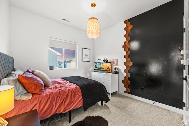bedroom with carpet and visible vents