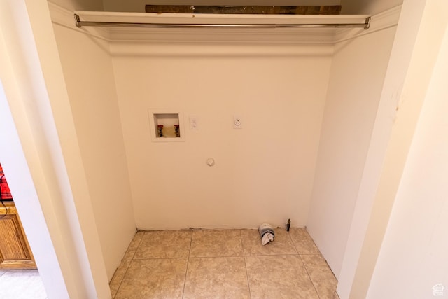 laundry room with washer hookup, laundry area, hookup for an electric dryer, gas dryer hookup, and light tile patterned flooring