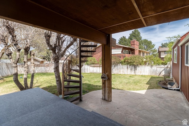 view of patio / terrace with a fenced backyard and stairway