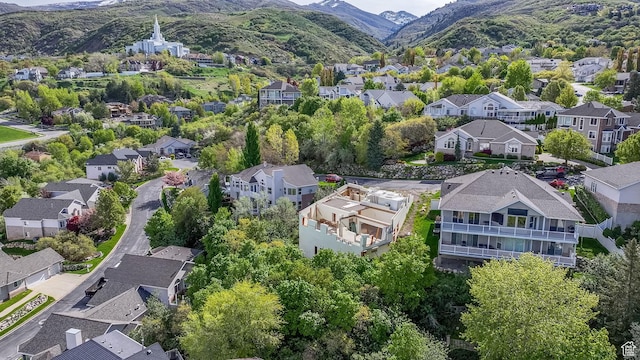drone / aerial view with a mountain view and a residential view