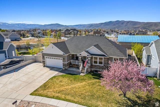 667 S Falkirk Rd Unit 24, Heber City, UT 84032 - view of front of home featuring stone siding, a residential view, an attached garage, and fence