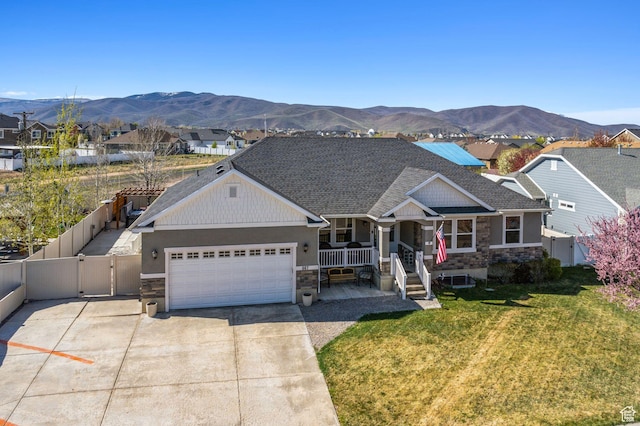 667 S Falkirk Rd Unit 24, Heber City, UT 84032 - view of front of home featuring driveway, a garage, covered porch, stone siding, and a gate