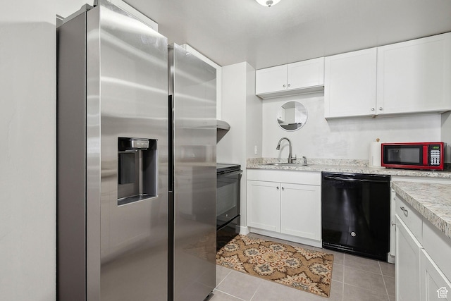 667 S Falkirk Rd Unit 24, Heber City, UT 84032 - kitchen featuring a sink, light tile patterned flooring, black appliances, and white cabinets