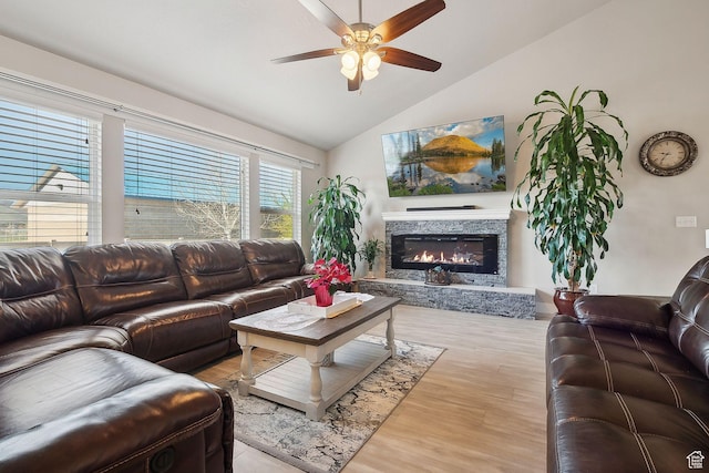 667 S Falkirk Rd Unit 24, Heber City, UT 84032 - living room with wood finished floors, vaulted ceiling, a fireplace, and a ceiling fan