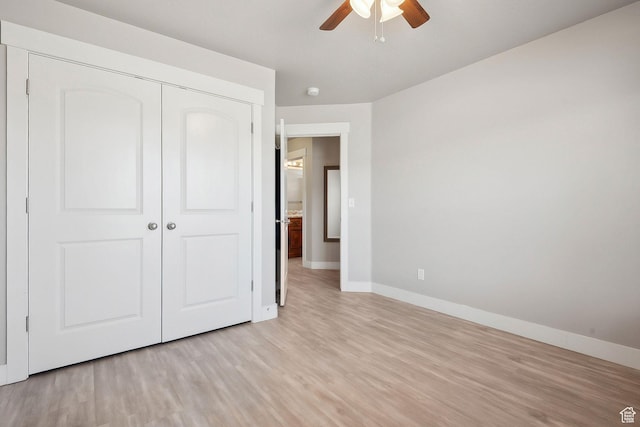 667 S Falkirk Rd Unit 24, Heber City, UT 84032 - unfurnished bedroom with a closet, light wood-type flooring, baseboards, and a ceiling fan