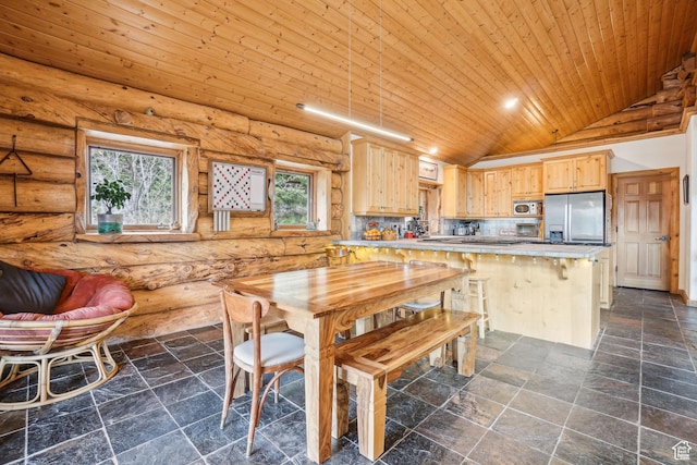 dining space featuring wood ceiling, log walls, lofted ceiling, and stone tile flooring