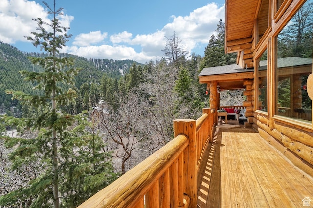 deck with a wooded view