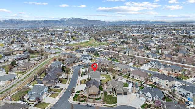 aerial view featuring a residential view and a mountain view