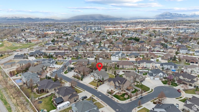 aerial view with a mountain view and a residential view