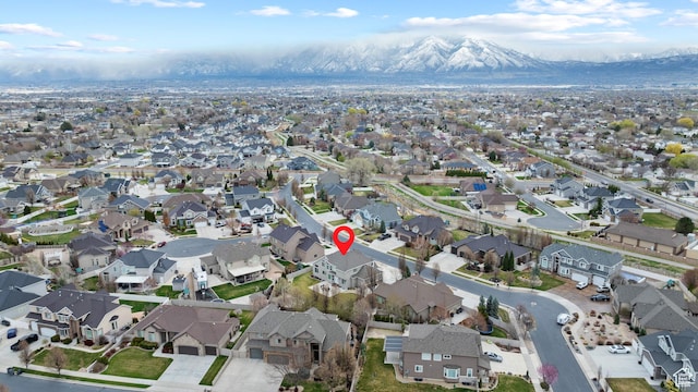 bird's eye view featuring a residential view and a mountain view