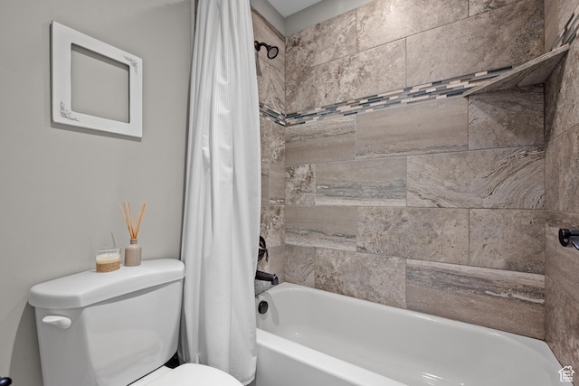 bathroom with toilet and shower / tub combo