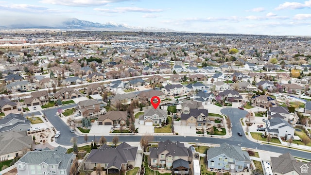 drone / aerial view with a mountain view and a residential view