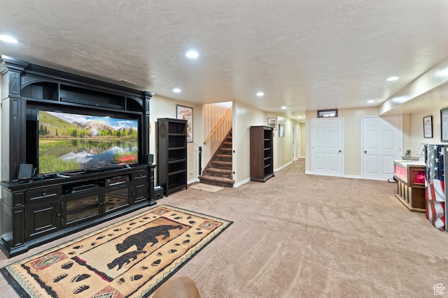 living area with light colored carpet, stairway, baseboards, and recessed lighting