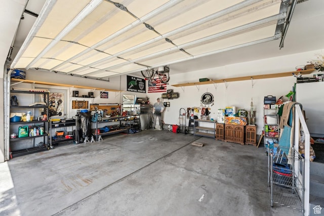 garage with a workshop area