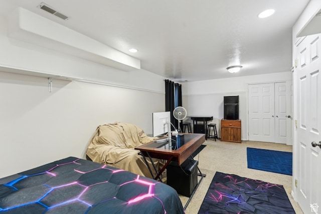 carpeted bedroom featuring visible vents and recessed lighting