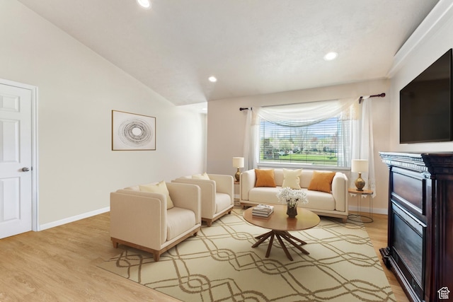 801 E 380 N Unit 57, Heber City, UT 84032 - living area with recessed lighting, light wood-type flooring, a glass covered fireplace, and lofted ceiling