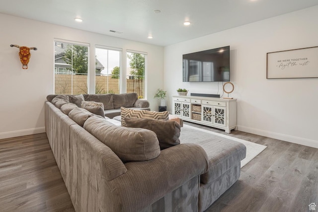 5740 Cardinal Wing Dr Unit 17, St George, UT 84790 - living area with wood finished floors, visible vents, baseboards, and recessed lighting