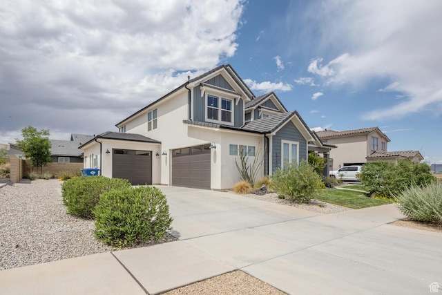 5740 Cardinal Wing Dr Unit 17, St George, UT 84790 - traditional-style home with concrete driveway, a garage, stucco siding, and fence