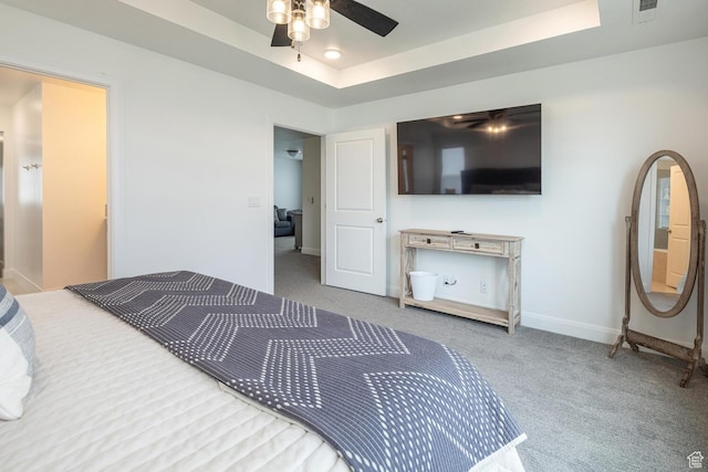5740 Cardinal Wing Dr Unit 17, St George, UT 84790 - bedroom featuring a tray ceiling, carpet, visible vents, and baseboards