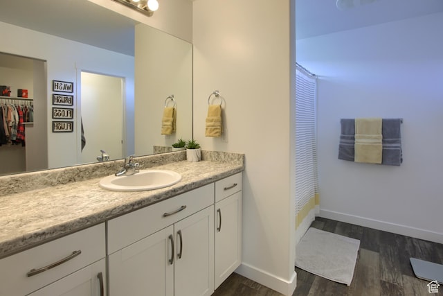 452 S Highpoint Dr, Saratoga Springs, UT 84045 - bathroom featuring vanity, a shower with curtain, baseboards, and wood finished floors