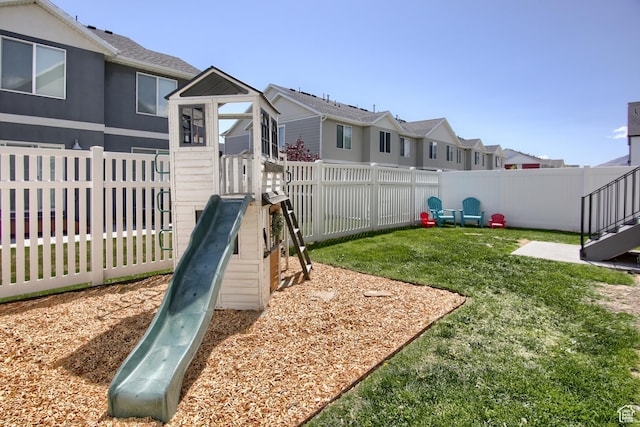 452 S Highpoint Dr, Saratoga Springs, UT 84045 - view of yard featuring a playground, a residential view, and a fenced backyard