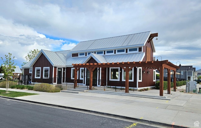 452 S Highpoint Dr, Saratoga Springs, UT 84045 - view of front of home featuring metal roof and board and batten siding