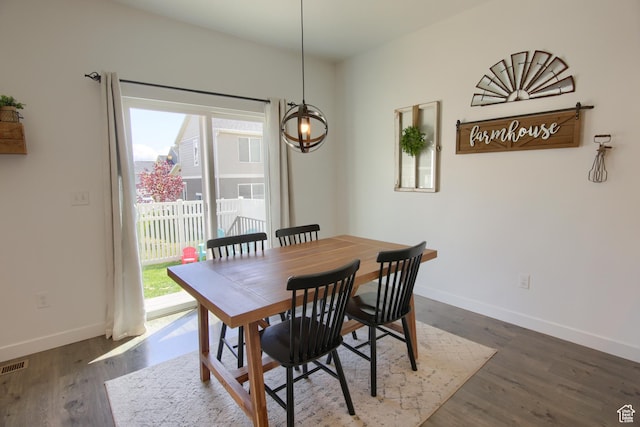 452 S Highpoint Dr, Saratoga Springs, UT 84045 - dining space featuring baseboards, dark wood finished floors, visible vents, and plenty of natural light