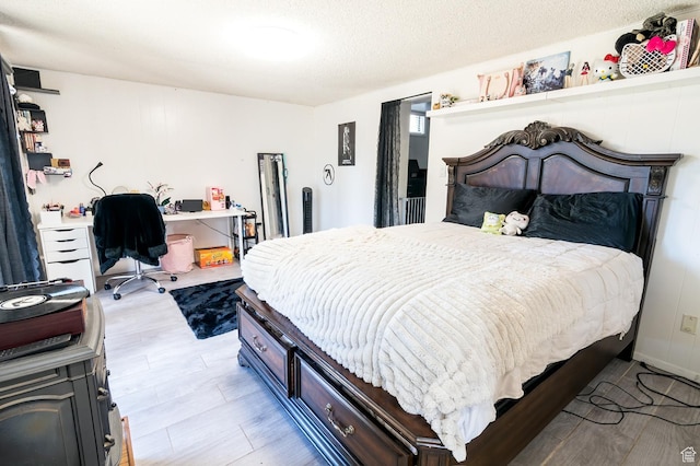 bedroom with light wood-type flooring