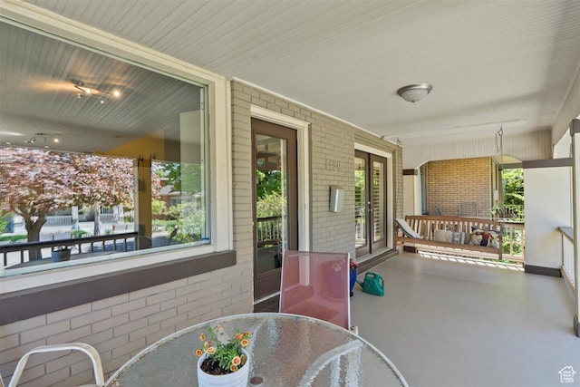 1159 S Windsor St, Salt Lake City, UT 84105 - view of patio / terrace featuring covered porch and outdoor dining area