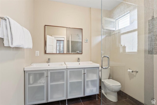 1159 S Windsor St, Salt Lake City, UT 84105 - full bath featuring tile patterned floors, double vanity, tiled shower, and a sink
