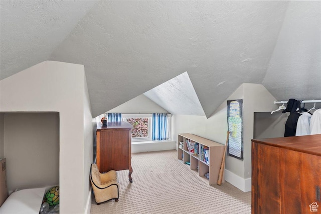 1159 S Windsor St, Salt Lake City, UT 84105 - carpeted bedroom with baseboards, a textured ceiling, and vaulted ceiling