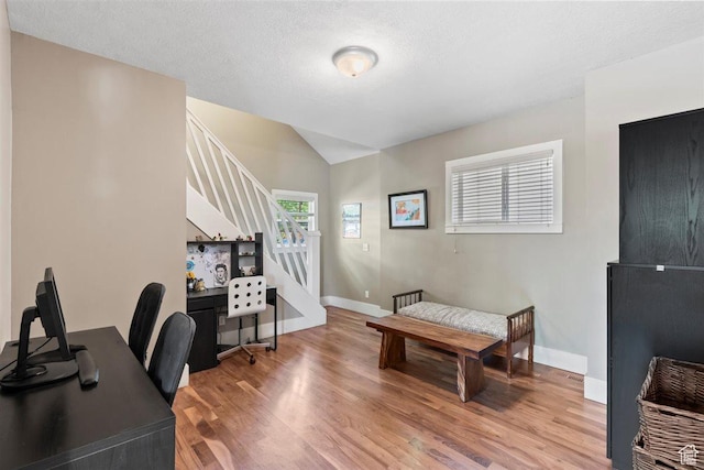 1159 S Windsor St, Salt Lake City, UT 84105 - office with vaulted ceiling, light wood finished floors, a textured ceiling, and baseboards