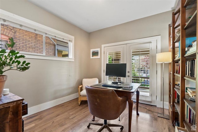 1159 S Windsor St, Salt Lake City, UT 84105 - home office featuring baseboards and wood finished floors
