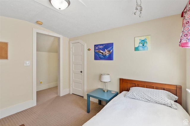 1159 S Windsor St, Salt Lake City, UT 84105 - bedroom with vaulted ceiling, carpet floors, and baseboards