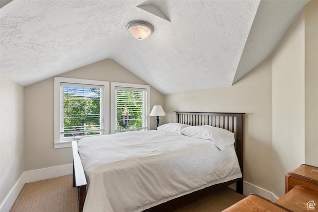 1159 S Windsor St, Salt Lake City, UT 84105 - bedroom with vaulted ceiling, a textured ceiling, carpet flooring, and baseboards