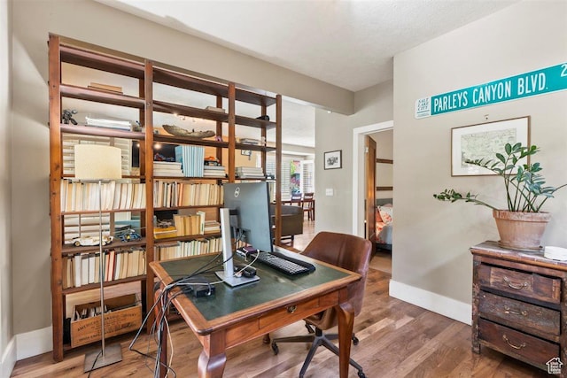 1159 S Windsor St, Salt Lake City, UT 84105 - office featuring wood finished floors and baseboards